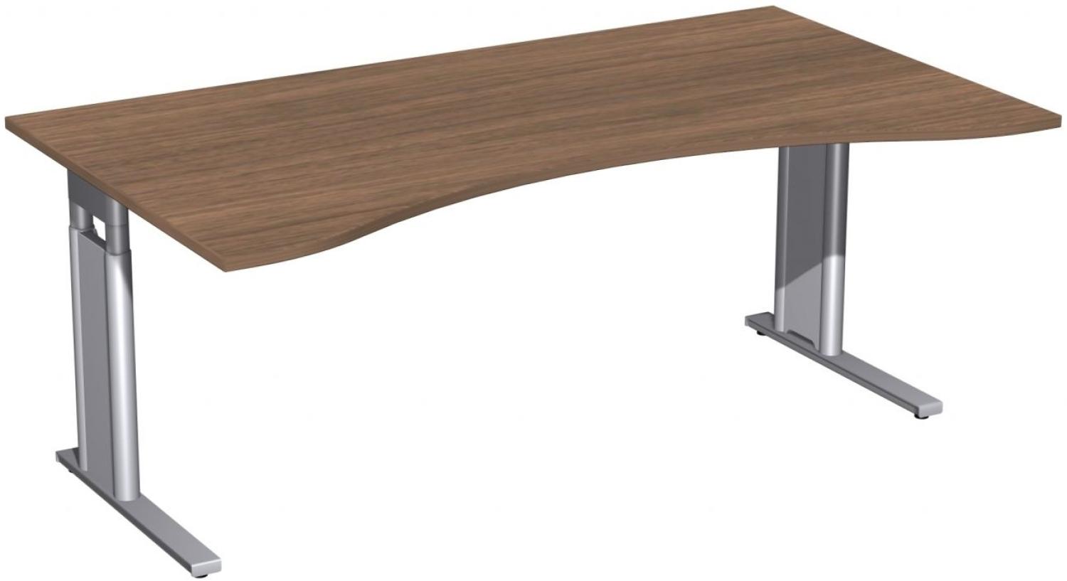 Schreibtisch 'C Fuß Pro' Ergonomieform, höhenverstellbar, 180x100cm, Nussbaum / Silber Bild 1