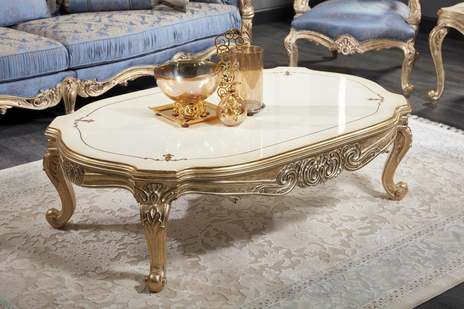 Casa Padrino Luxus Barock Couchtisch Weiß / Antik Gold 143 x 94 x H. 44 cm - Prunkvoller Barock Wohnzimmertisch Bild 1