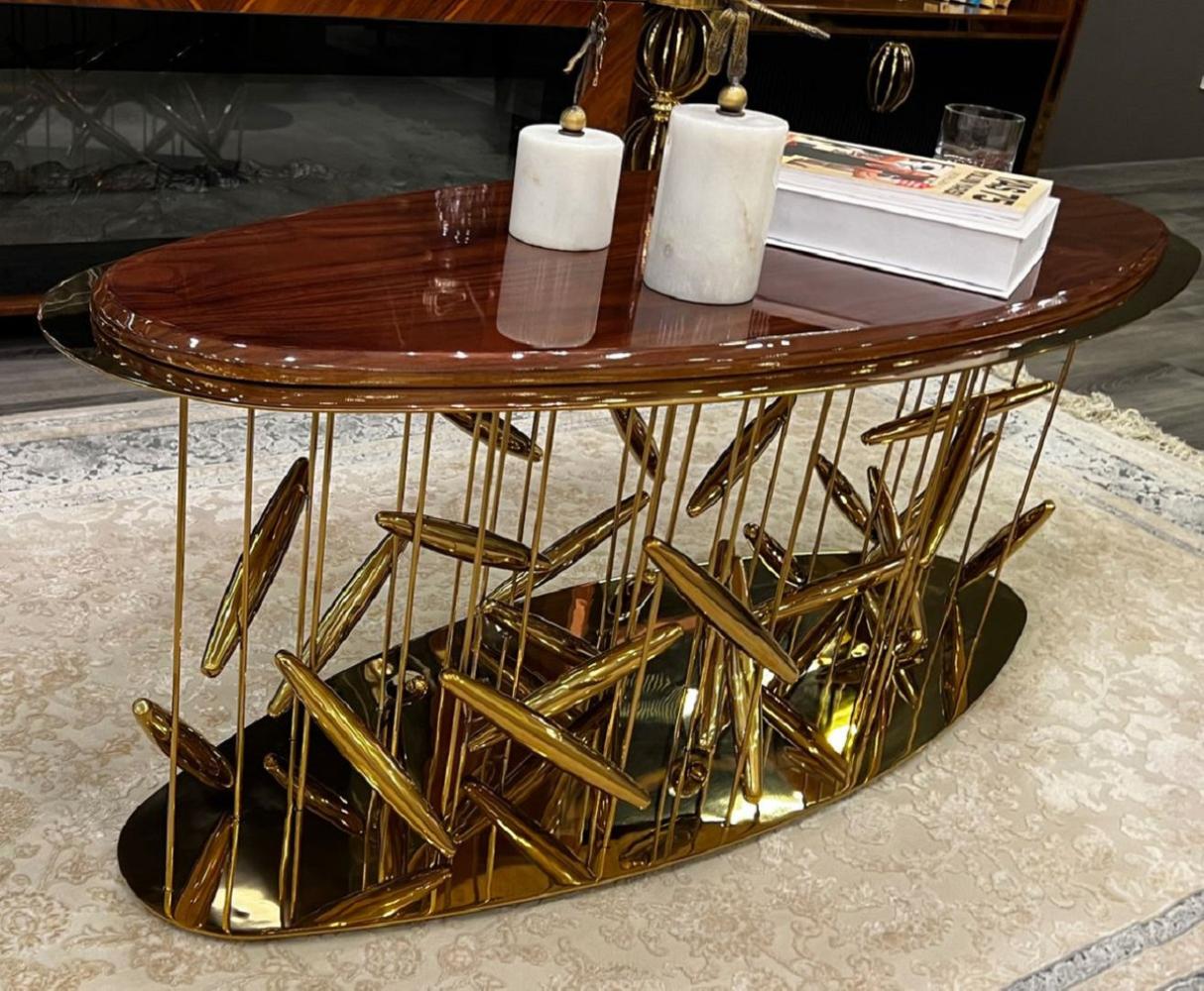 Casa Padrino Luxus Couchtisch Braun / Gold 120 x 51 x H. 47 cm - Ovaler Edelstahl Wohnzimmertisch mit Massivholz Tischplatte - Wohnzimmer Möbel - Hotel Möbel - Luxus Möbel Bild 1