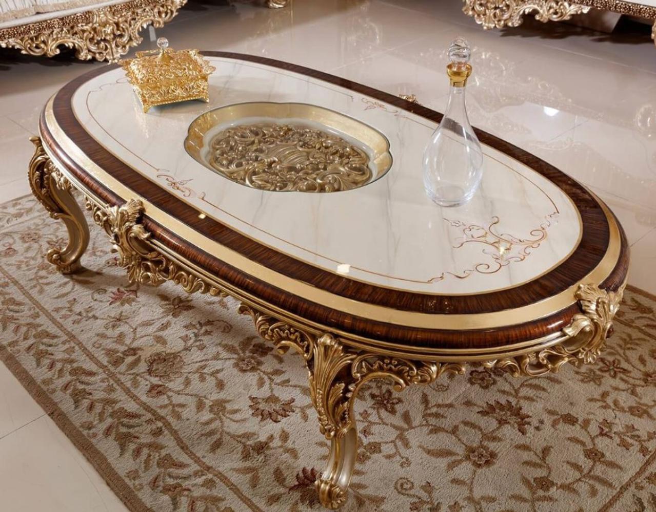 Casa Padrino Luxus Barock Couchtisch Weiß / Braun / Gold - Prunkvoller Wohnzimmertisch mit Glasplatte - Barock Wohnzimmer Möbel - Edel & Prunkvoll Bild 1