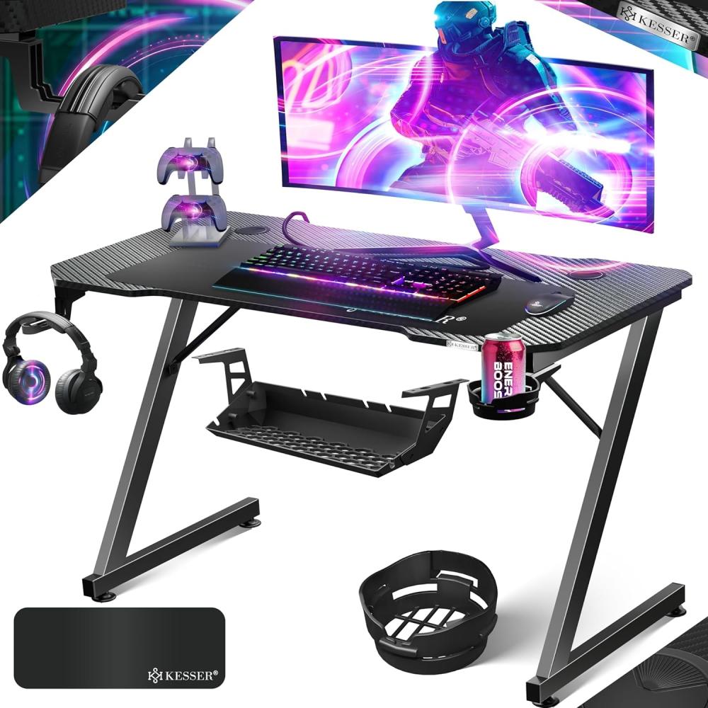 KESSER® Gaming Tisch LED | Z-Form Gamer Schreibtisch | Kopfhörerhaken & Kohlebeschichtung | Ergonomischer PC Computertisch | Stabiler Tisch mit Mauspad & Getränkehalter 100 x 60 cm, Schwarz Carbon Bild 1