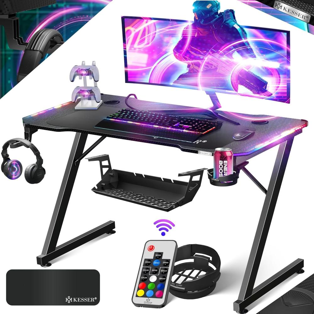 KESSER® Gaming Tisch LED | Z-Form Gamer Schreibtisch | Kopfhörerhaken & Kohlebeschichtung | Ergonomischer PC Computertisch | Stabiler Tisch mit Mauspad & Getränkehalter 100 x 60 cm, Schwarz Carbon mit LED Bild 1