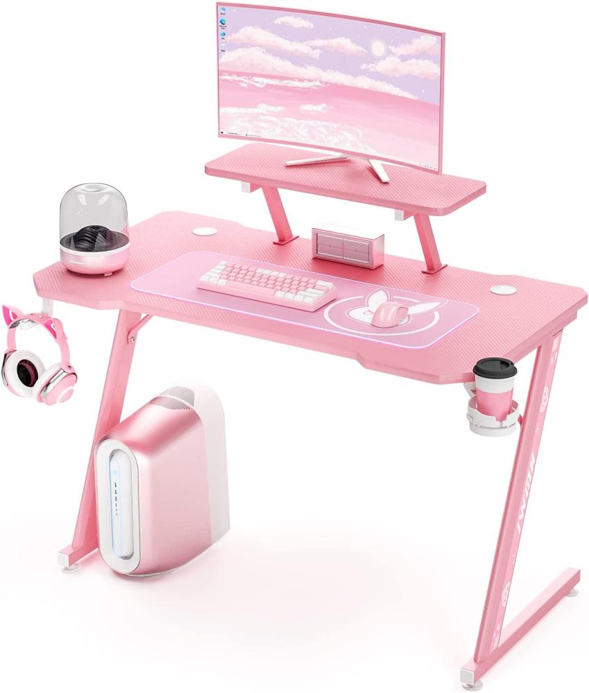 Intimate WM Heart Gaming Tisch 110cm, Ergonomischer Computertisch, Schreibtisch mit Tischplatte aus Kohlefaser, Drehbarer Headsethalter, Griffhalter und Getränkehalter, Rosa Bild 1