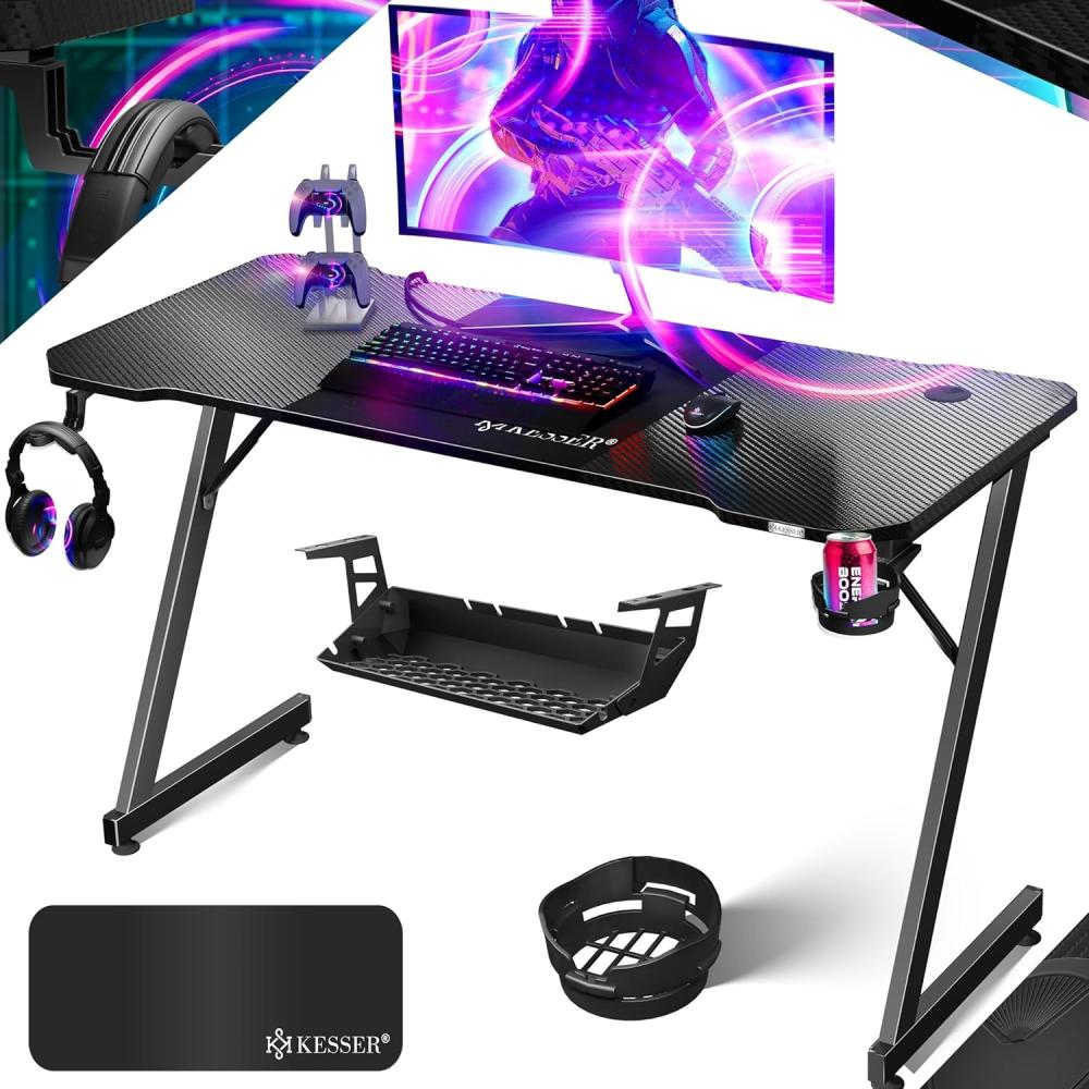 KESSER® Gaming Tisch LED | Z-Form Gamer Schreibtisch | Kopfhörerhaken & Kohlebeschichtung | Ergonomischer PC Computertisch | Stabiler Tisch mit Mauspad & Getränkehalter Schwarz Carbon, 140 x 60 cm Bild 1