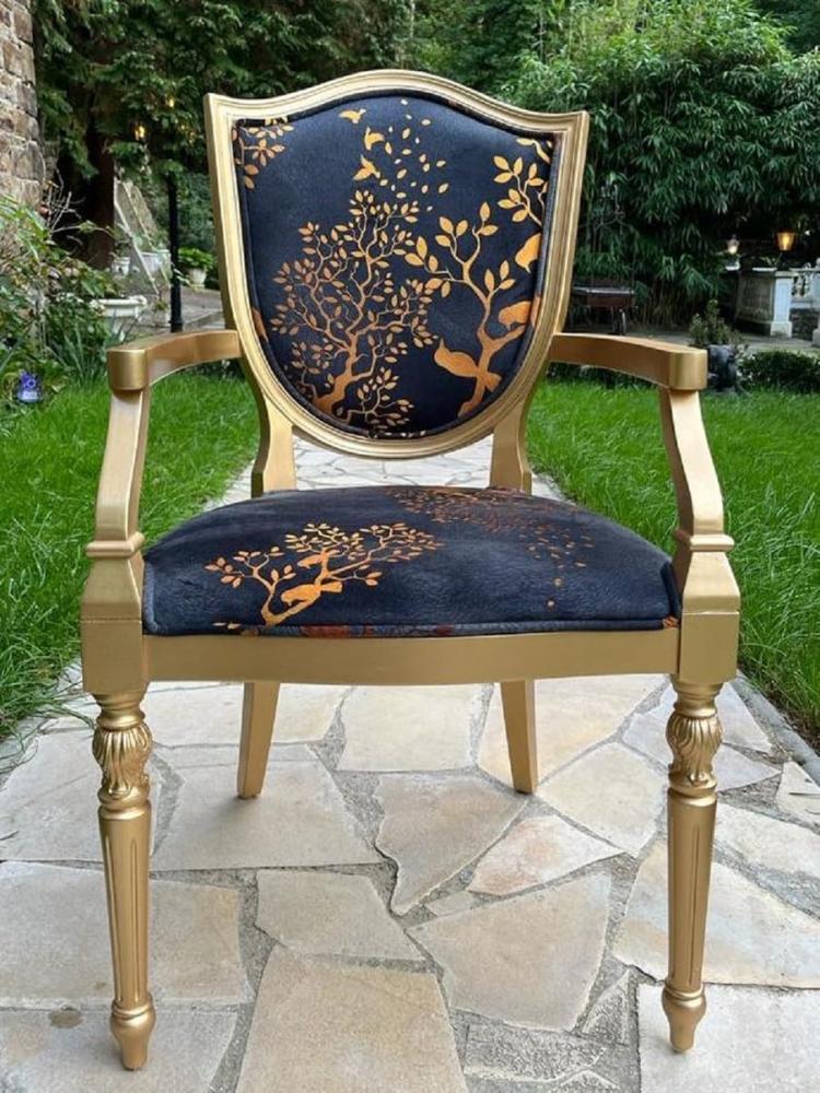 Casa Padrino Luxus Art Deco Esszimmer Stuhl Schwarz / Gold - Eleganter Massivholz Stuhl mit Armlehnen - Art Deco Esszimmer Möbel Bild 1