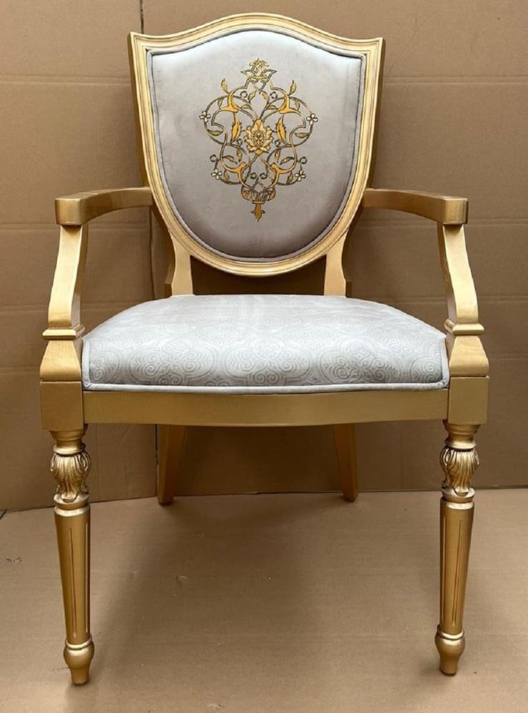 Casa Padrino Luxus Art Deco Esszimmer Stuhl Grau / Gold - Eleganter Massivholz Stuhl mit Armlehnen - Art Deco Esszimmer Möbel Bild 1