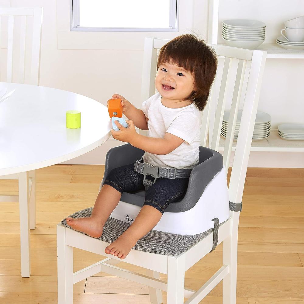 Ingenuity Sitzerhöhung Stuhl, Essen und Fütterung Sitz für Kleinkinder, Boostersitz mit Dreipunktgurt für mehr Sicherheit, leicht zu reinigen, ideal für unterwegs geeignet, ab 16 Monaten Bild 1