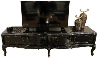 Casa Padrino Luxus Barock TV Schrank Schwarz / Antik Gold 222 x 50 x H. 62 cm - Edler Fernsehschrank mit 4 Türen und Glasplatte - Hochwertige Wohnzimmer Möbel im Barockstil