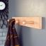 Sossai® Wandgarderobe aus Holz | Natürliche Optik - hochwertiges Buchenholz | HG1 | seidenmatt lakiert | Hakenleiste mit 2 Garderobenhaken | Breite: 21 cm Bild 2